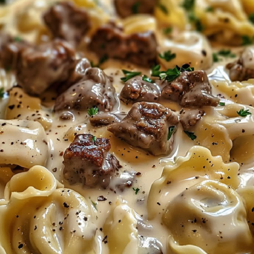 Cheesesteak Tortellini in Creamy Provolone Sauce 26 Savory Cheesesteak Tortellini in Creamy Provolone Sauce